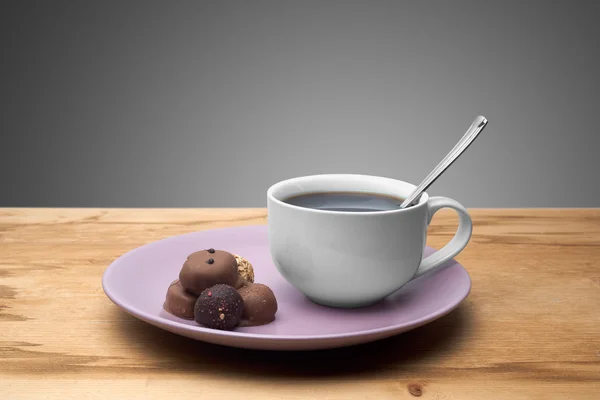 Cupcakes with chocolate on the plate — Stock Photo, Image