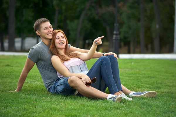 Girl shows finger direction — Stock Photo, Image