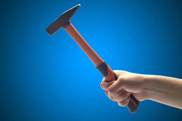 Mano sosteniendo un martillo — Foto de Stock