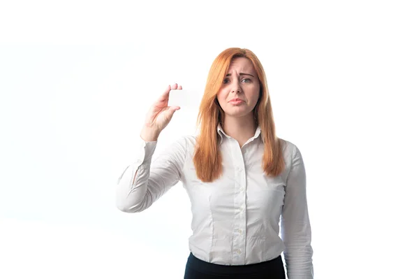 Distressed woman holding a business card — Stock Photo, Image