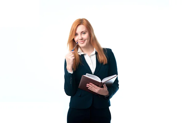 Beautiful business woman holding a diary — Stock Photo, Image