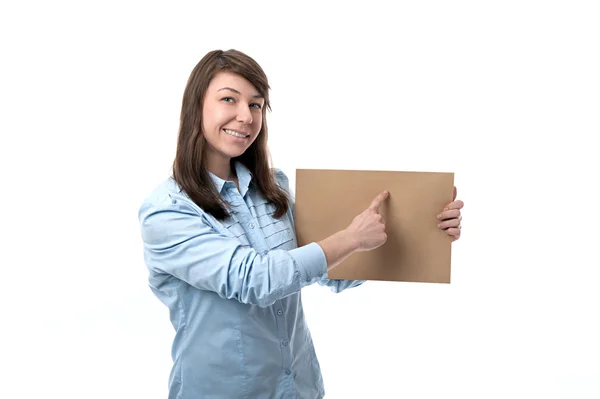 Smiling woman shows paper — Stock Photo, Image