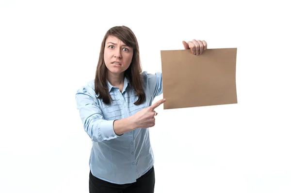Strict woman points to a sheet of paper — Stock Photo, Image