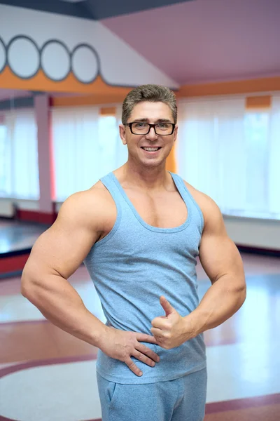 Adult muscular man in a vest — Stock Photo, Image