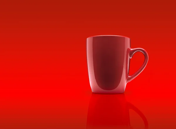 Tasse de café rouge sur un fond rouge — Photo