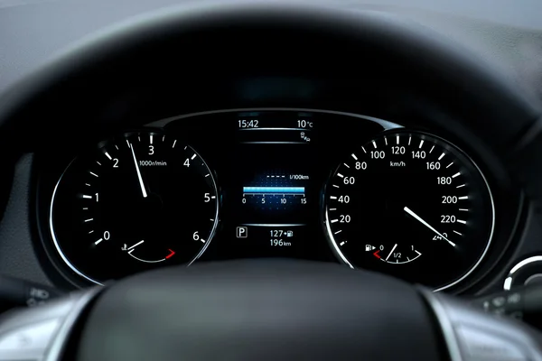 Modern car speedometer and illuminated dashboard — Stock Photo, Image