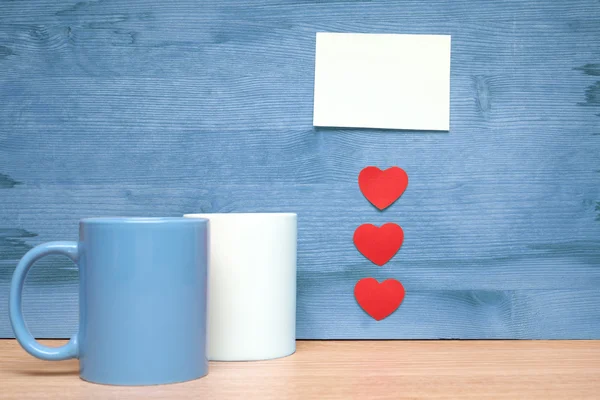 Heart and cup on a blue background — Stock Photo, Image