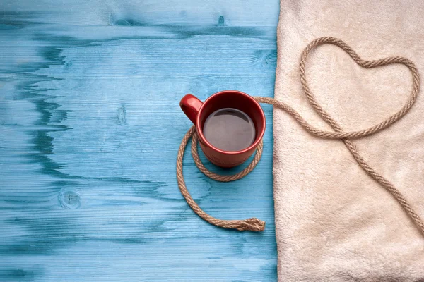 A cup of coffee on the wooden table — Stock Photo, Image