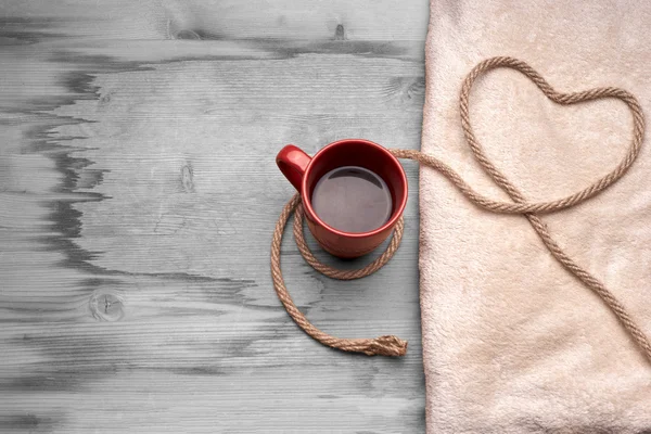 A cup of coffee on the wooden table — Stock Photo, Image