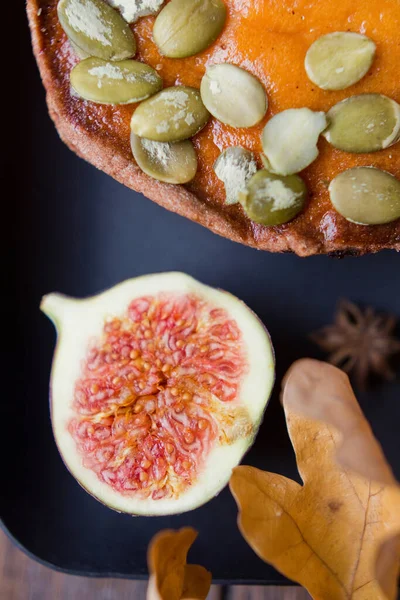 Pumpkin Pies Black Plate Figs Cinnamon Sticks Star Anise Persimmons — Stock Photo, Image
