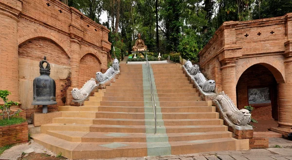 Suthep in Chiang Mai, Thailand next monk like the foot — Stock Photo, Image