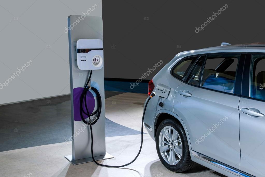 Electric car charging stations Stock Photo by ©jingaiping 66852843