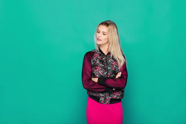 Blonde modern woman on blue background — Stock Photo, Image