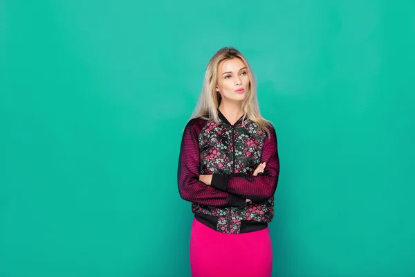 Blonde modern woman on blue background — Stock Photo, Image