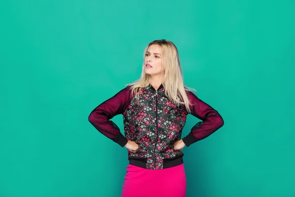 Blonde modern woman on blue background — Stock Photo, Image