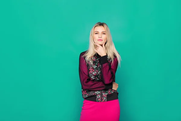 Blonde modern woman on blue background — Stock Photo, Image