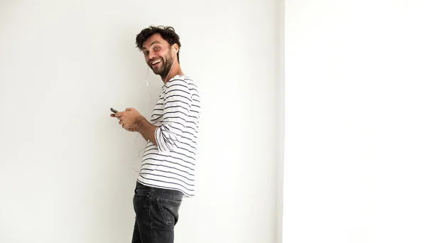 Cool man with stripped shirt standing — Stock Photo, Image