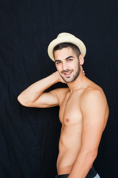 Handsome man half naked on black background — Stock Photo, Image