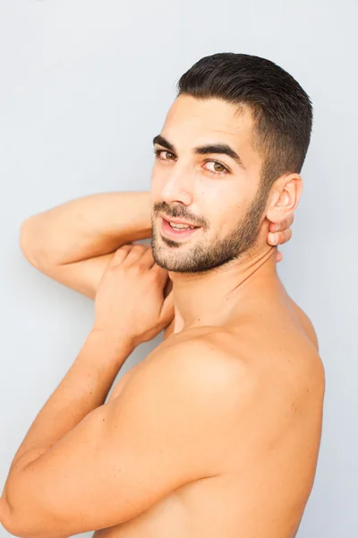 Handsome man half naked on white background — Stock Photo, Image