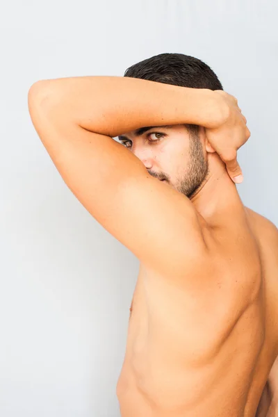 Handsome man half naked on white background — Stock Photo, Image