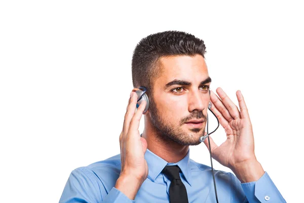 Male operator, handsome hispanic man in formal wear — Stock Photo, Image