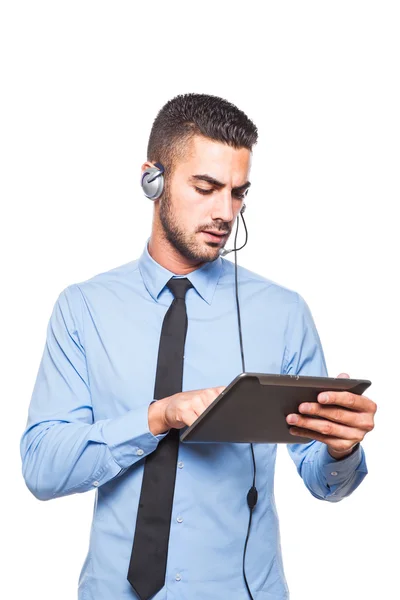 Male operator in formal wear with a tablet — Stock Photo, Image