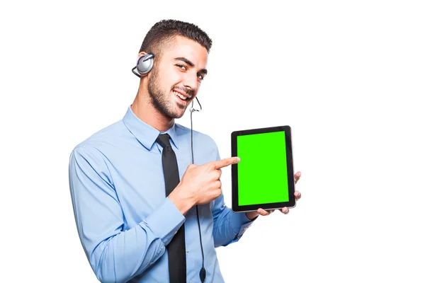 Male operator in formal wear with a tablet — Stock Photo, Image