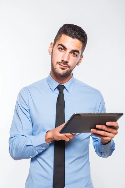 Eleganter schöner Mann mit Tablette — Stockfoto