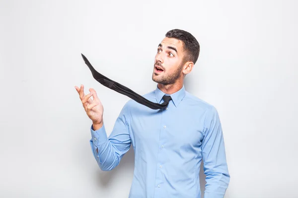 Single elegant man in blue shirt with black tie — Stock Photo, Image