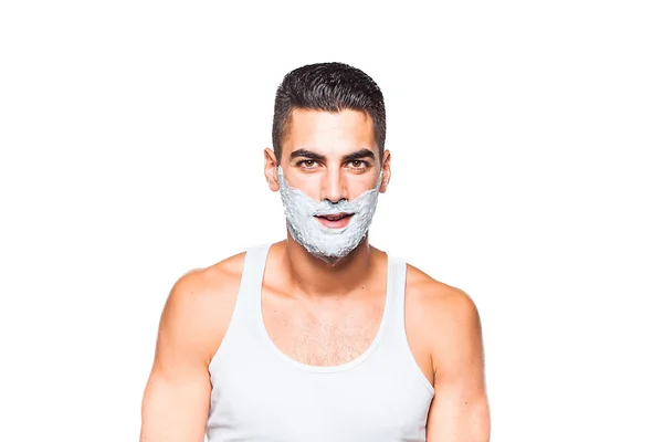 Homem bonito com creme de barbear — Fotografia de Stock