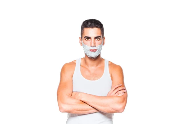 Homem bonito com creme de barbear — Fotografia de Stock