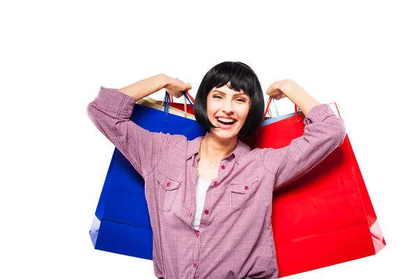 Jeune femme brune avec des sacs à provisions — Photo