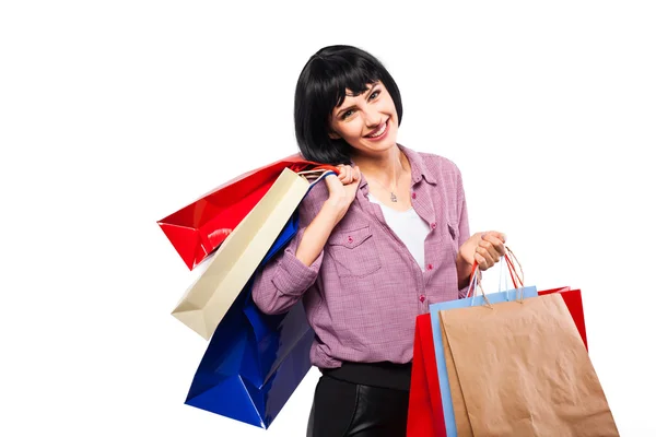 Joven morena mujer con bolsas de compras — Foto de Stock