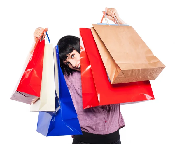 Jeune femme brune avec des sacs à provisions — Photo