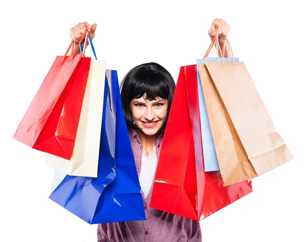 Jeune femme brune avec des sacs à provisions — Photo