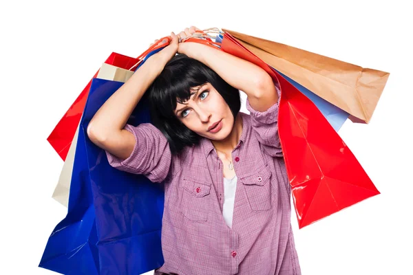 Jeune femme brune avec des sacs à provisions — Photo