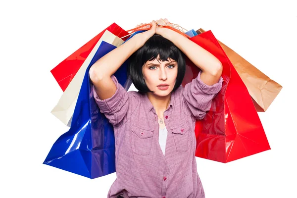 Young brunette woman with shopping bags — Stock Photo, Image