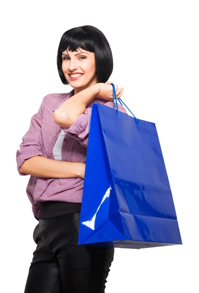 Junge brünette Frau mit Einkaufstasche — Stockfoto
