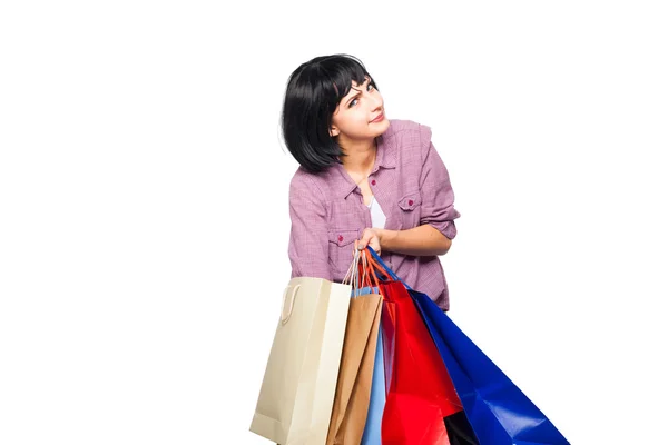 Giovane donna bruna con borse della spesa — Foto Stock