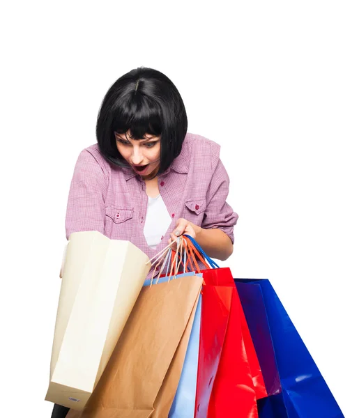 Giovane donna bruna con borse della spesa — Foto Stock
