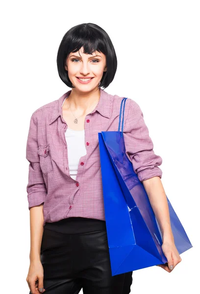 Νεαρή γυναίκα μελαχρινή με τσάντα για ψώνια — Φωτογραφία Αρχείου