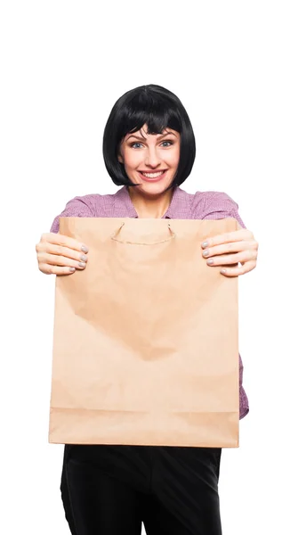 Jeune femme brune avec sac à provisions — Photo