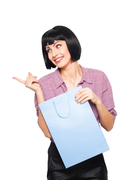 Jeune femme brune avec sac à provisions — Photo