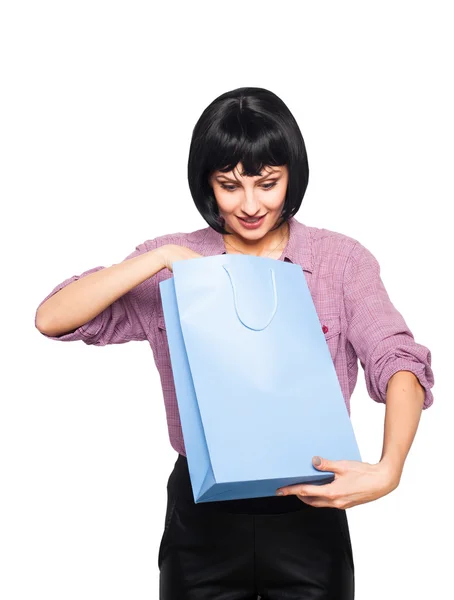 Junge brünette Frau mit Einkaufstasche — Stockfoto