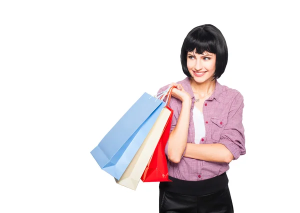 Jeune femme brune avec des sacs à provisions — Photo