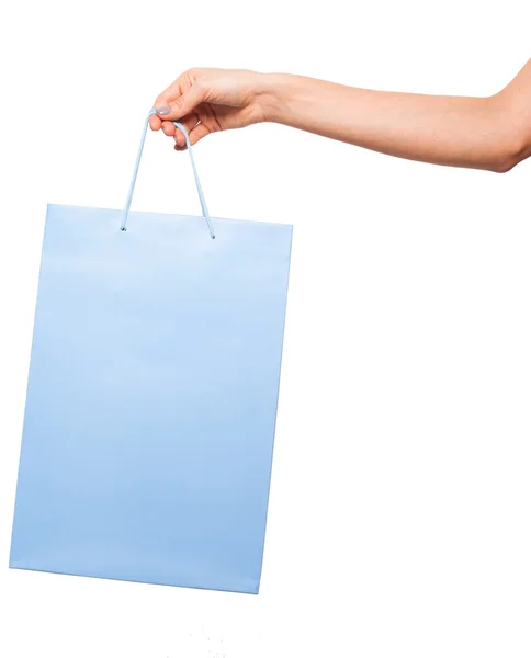 Trzymając się za ręce kolorowe torby na zakupy na białym tle — Zdjęcie stockowe