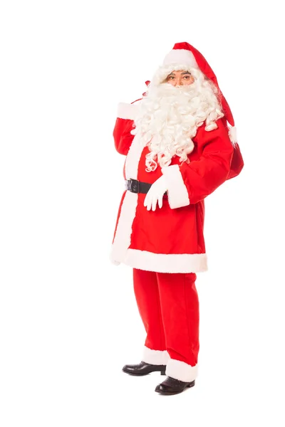 Papai Noel segurando seu saco de presentes no fundo branco — Fotografia de Stock
