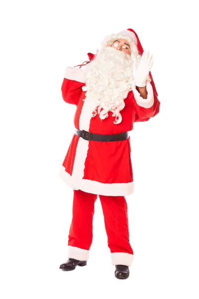 Santa claus holding his sack of gifts on white background — Stock Photo, Image