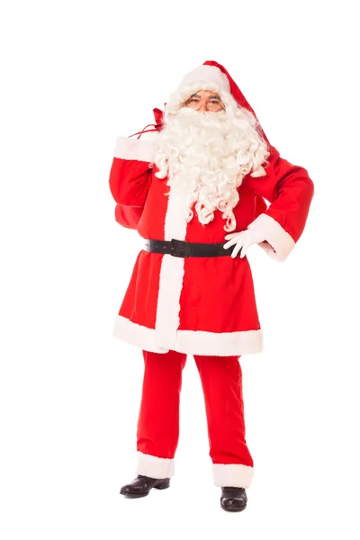 Santa claus holding his sack of gifts on white background — Stock Photo, Image