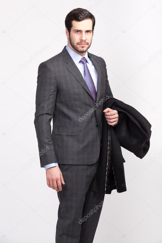 handsome office business man with beard dressed in elegant suit,